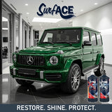 Green Mercedes-Benz SUV in a showroom with Surf-ACE car care products displayed