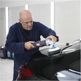 Man using car polishing equipment with Surf-ACE P-40 Extra product on a black car