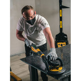Technician polishing a countertop with a LEROS-S sander and Abralon J3