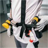 Person wearing a Mirka 8991199111 work belt with tools