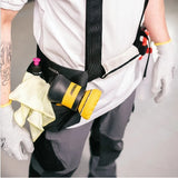 Person wearing a Mirka 8991199111 work belt with tools and Polarshine polish
