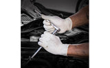 Person working on a car engine with tools, wearing Dyna Grip Latex white gloves.