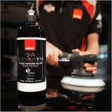 RUPES D-A ULTRA-FINE Ultra Finishing Polish, 1L 9.DAULTRAFINE, bottle in front of technician polishing a car panel