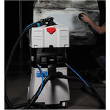 RUPES S245EPL 45L Dust Extractor, set up with two tools, two coaxial vacuum hose and air inline connections, T-Loc Systainer storage case, and a technician sanding a door panel