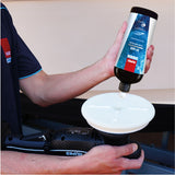 RUPES Marine XF-600 Ultra-Fine Polish, being applied to a white foam pad and rotary polisher