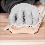 Sunmight Gold Soft Flex Foam Hand Sanding Pads being used to sand a wooden part
